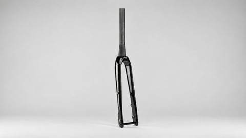 Seido BANJO carbon fork in gloss black, standing upright on a grey background with its uncut steerer.