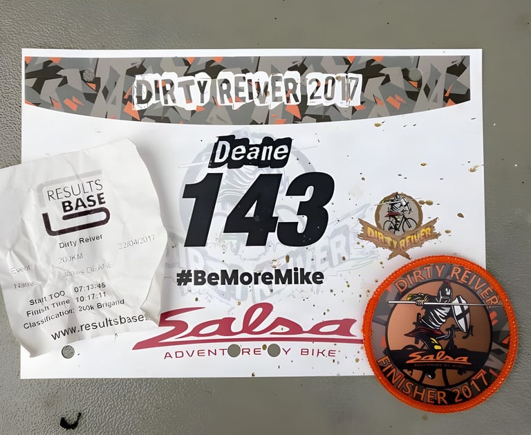 Dirty Reiver 2017 race number 143 with a Results Base slip showing a 200km finish time of 10:17:11 and a finisher patch.