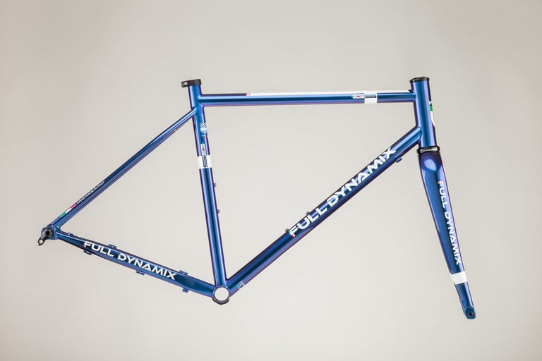 Full Dynamix Gravel S steel frame and fork in blue, side view with Columbus tubing, on a plain background.