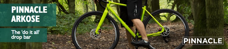 Pinnacle Arkose banner: a lime-green drop-bar bike in woodland with the tagline 'The do it all drop bar'.