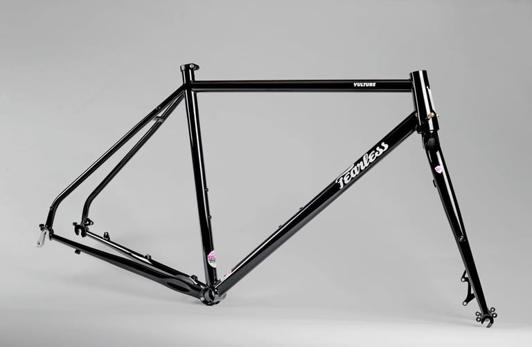 Black Fearless Vulture Mk1 steel frame and 404 fork against a grey studio backdrop.