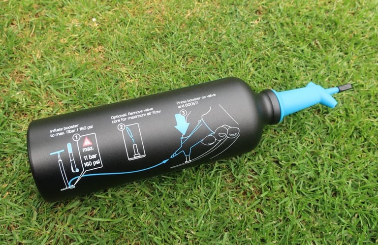 MilKit Booster bottle printed with three-step inflation instructions, 11 bar and 160 psi maximum.
