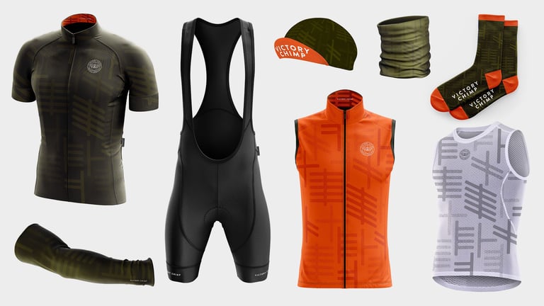 Victory Chimp Ogham Collection in olive green and orange: jersey, bib shorts, gilet, arm warmer, cap, buff and socks.