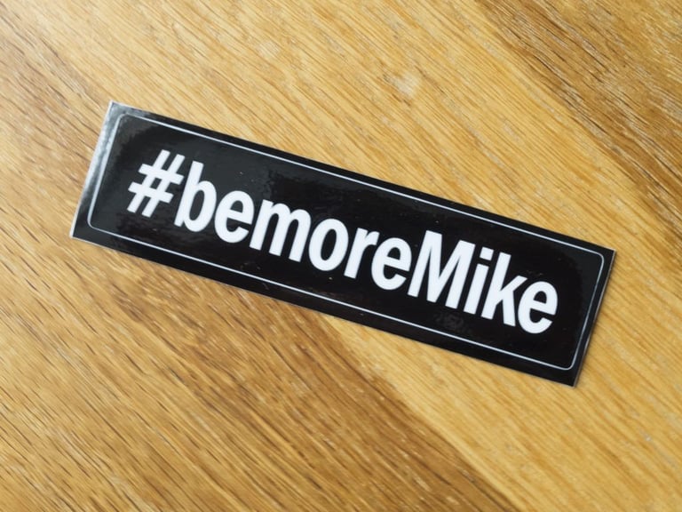 #bemoreMike sticker in white on black, the slogan of the Mike Hall memorial This Is Not A Tour 400km Audax.