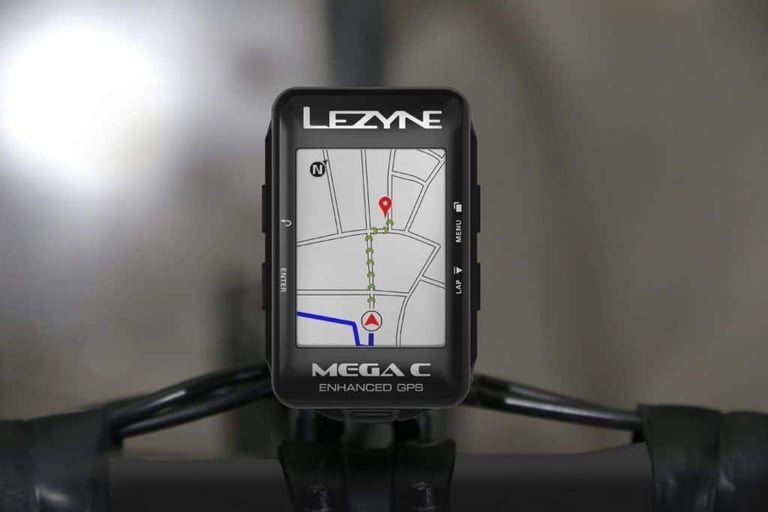 Lezyne Mega C GPS front on, with the map screen showing the route ahead and a red destination pin.