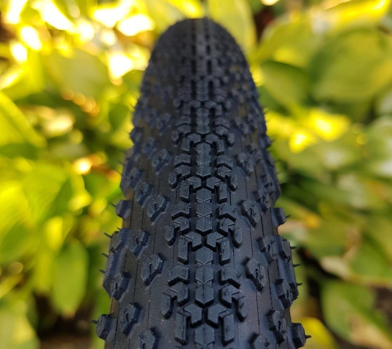 Front view of the Goodyear Connector tyre tread, with small centre knobs and larger shoulder knobs.