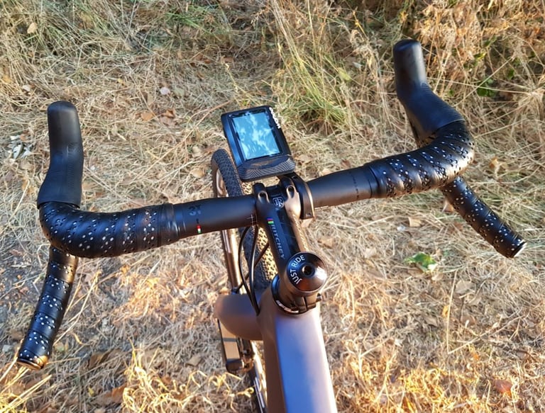 Black perforated ODI 3.5mm Performance Bar Tape wrapped on 3T drop bars, seen from the saddle.