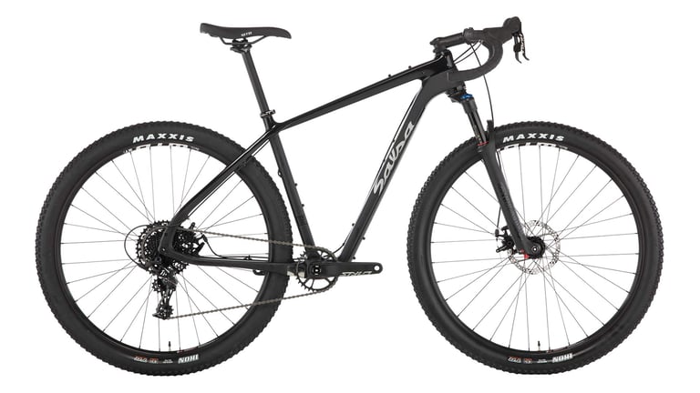 Salsa Cutthroat Apex 1 in black with a 100mm RockShox Reba suspension fork, drop bars and Maxxis tyres, side view.