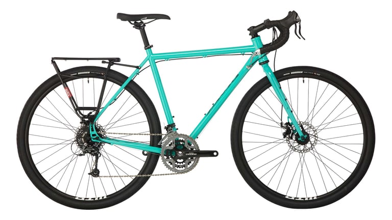 Salsa Marrakesh Deore touring bike in turquoise with rear rack, triple chainset and disc brakes, side view.