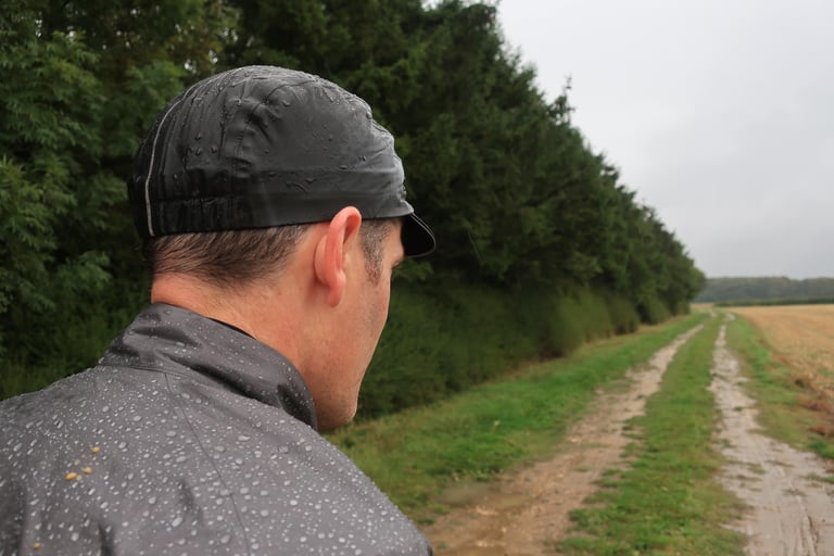 Water beads on the shoulders of the Gore-Tex Shakedry 1985 Viz jacket beside a farm track.