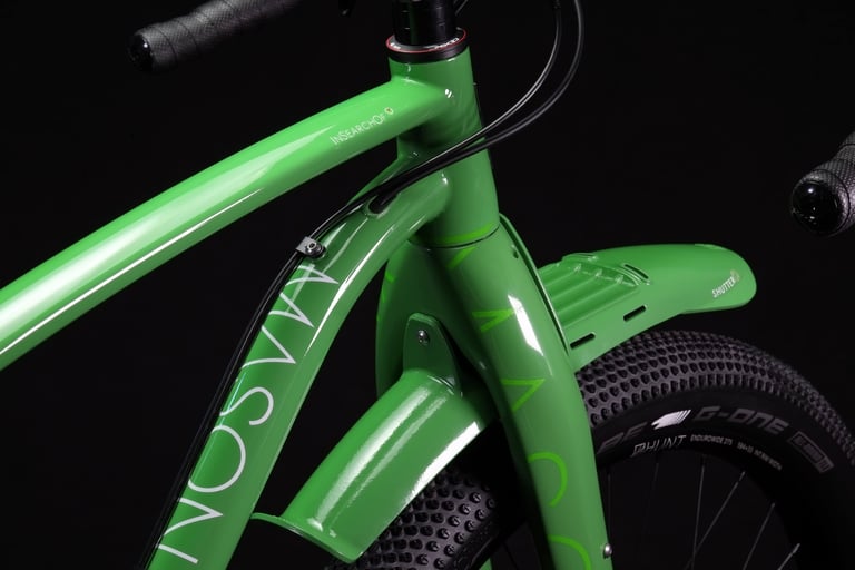 Mason Shutter mudguard in green on the ISO fork, above a Hunt wheel and Schwalbe G-One tyre.