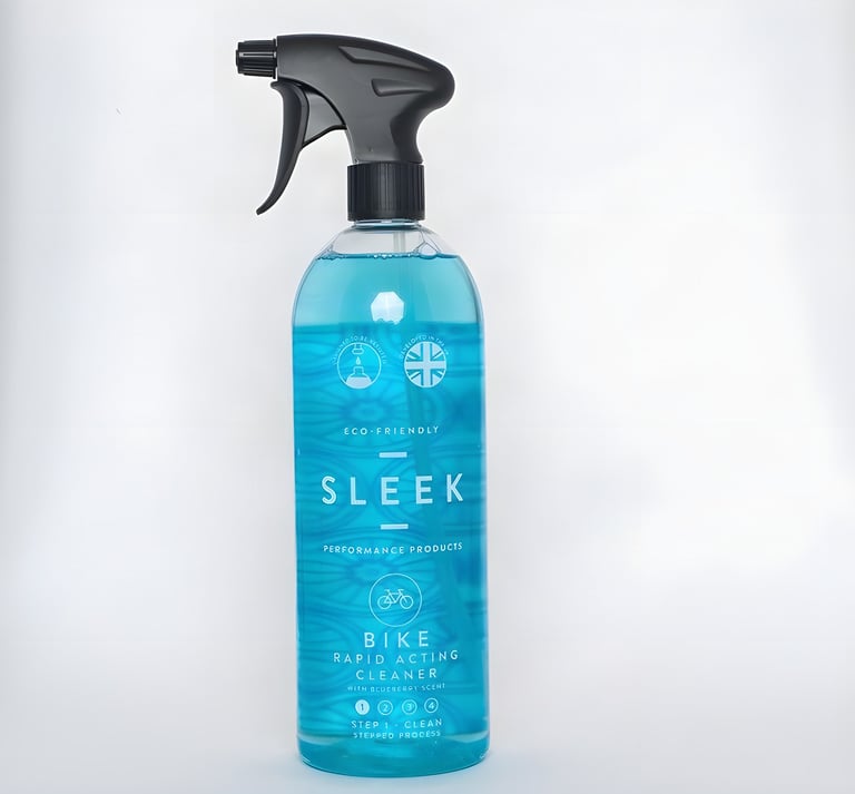 Sleek Bike Rapid Acting Cleaner in a one-litre spray bottle with blue liquid, on a plain pale background.