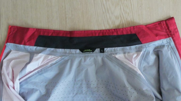Inside the collar of the Altura Nightvision Thunderstorm Jacket, showing the small patch of lining.