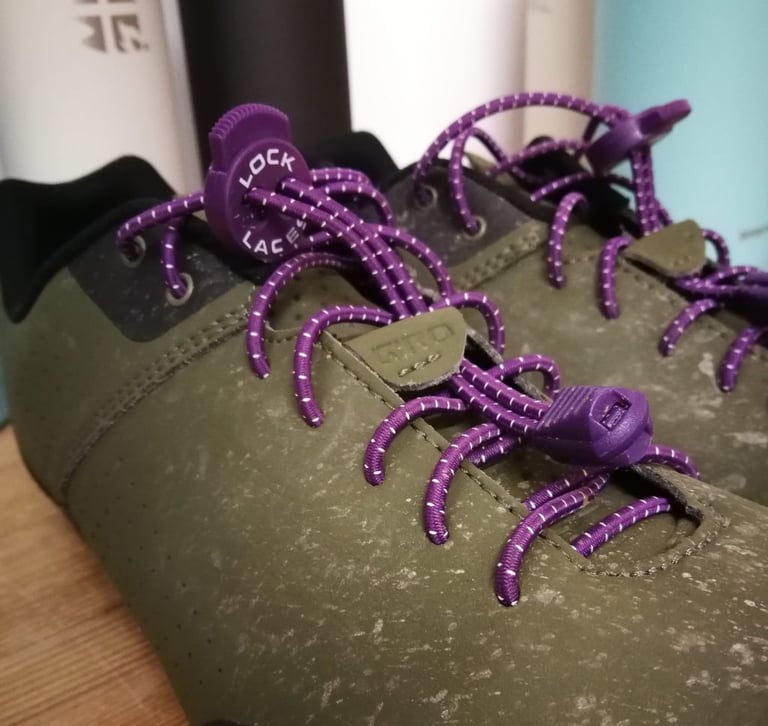 Purple Lock Laces with the sprung lace lock fitted to an olive Giro lace-up cycling shoe.