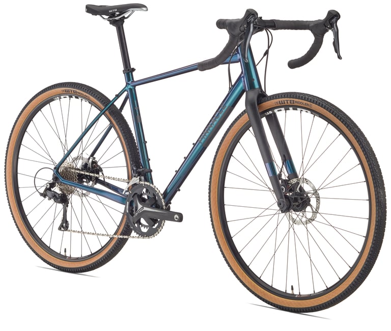 Pinnacle Arkose D1 gravel bike in metallic blue-green with tan wall WTB Riddler 45c tyres.
