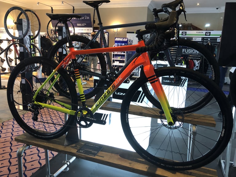 Kinesis Tripster AT limited edition gravel bike in an orange-to-yellow neon fade finish at CoreBike 2019.