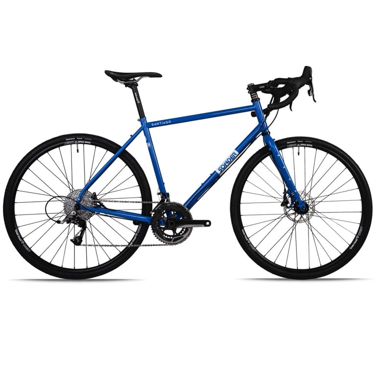Blue Sonder Santiago steel bike with SRAM Rival 2x drivetrain, drop bars and 700c wheels, side view.