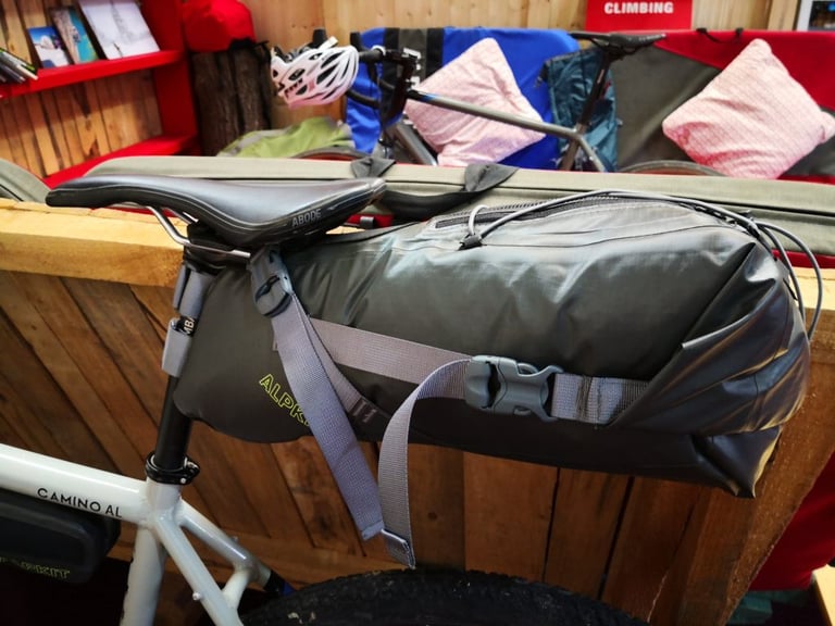 Alpkit waterproof seat pack on a Sonder Camino AL, strapped under an Abode saddle.