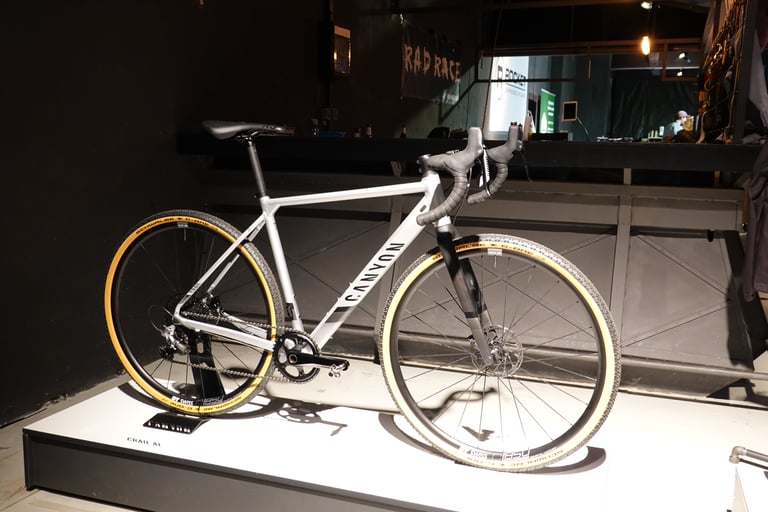 Canyon Grail Al gravel bike in grey with tan-wall tyres on display at the Kolektif Berlin Bike Fair.
