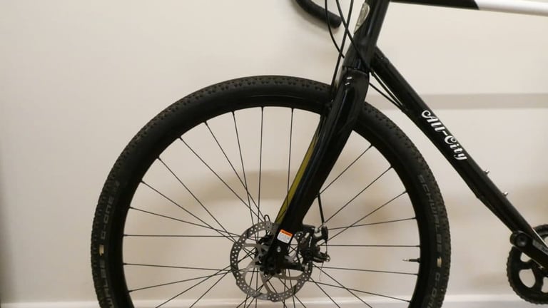 Halo Vapour front wheel with Schwalbe G-One tyre on the All City Cosmic Stallion, beside the black fork.