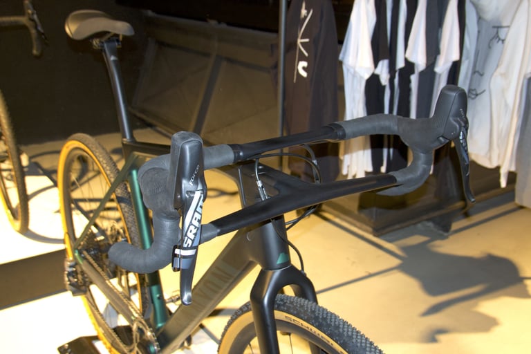Canyon CP01 Hover Bar cockpit with SRAM Force shifters and black bar tape on the Grail CF SLX.