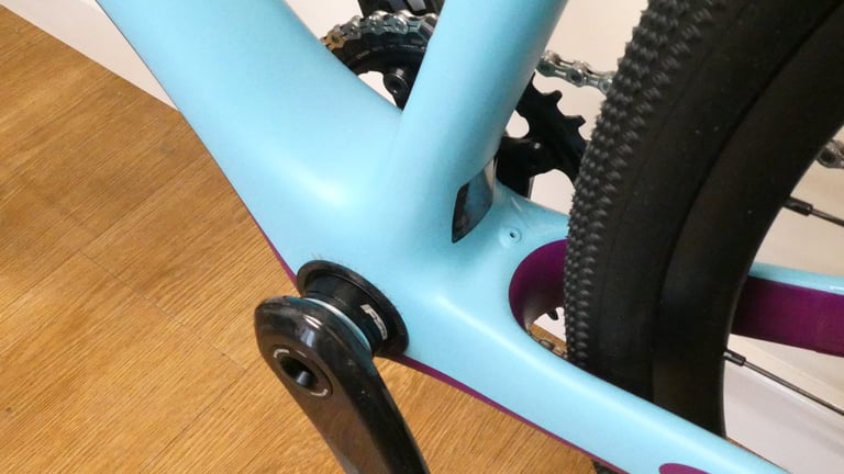 Close-up of the Orbea Terra's rear tyre sitting tight against the frame, showing the limited tyre clearance.