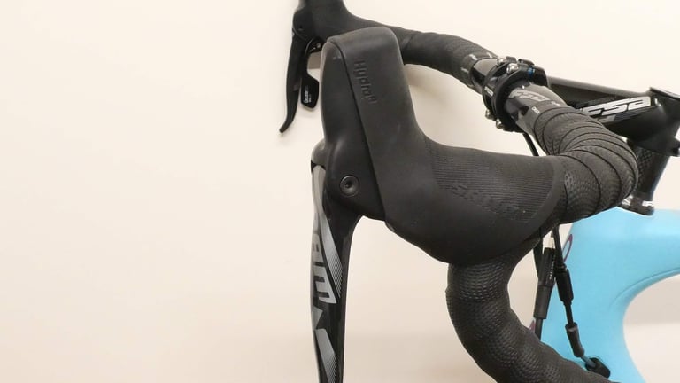 SRAM Force 1x hydraulic shifter and brake lever on the Orbea Terra's drop bars, beside the FSA stem.