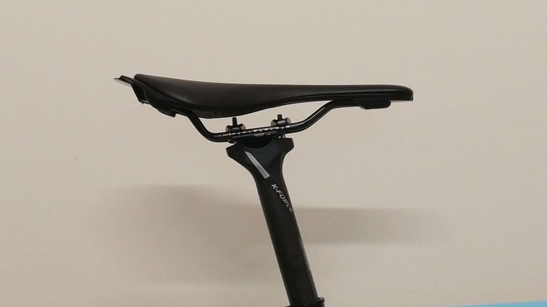Fizik Antares saddle on the Orbea Terra's carbon FSA K-Force seatpost, side view.