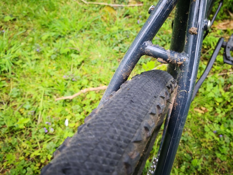 Challenge Gravel Grinder tyre sitting close to the seat stays and brake bridge on the BiViBIKES Bunker frame.