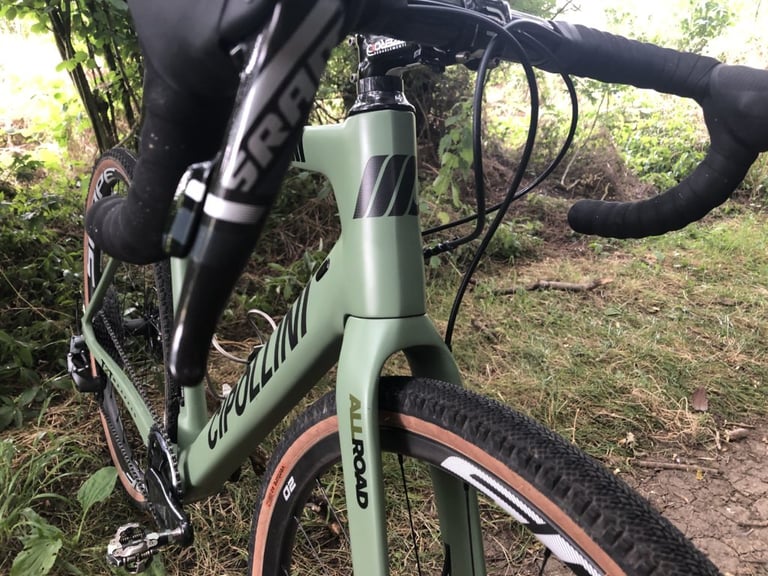 Head tube and fork crown of the Cipollini MCM All Road, showing the hand-finished tube junctions and SRAM shifter.