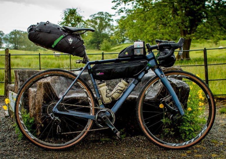 Lauf True Grit on Scope O2 wheels loaded with saddle, frame and bar bags for bikepacking in the Lake District.
