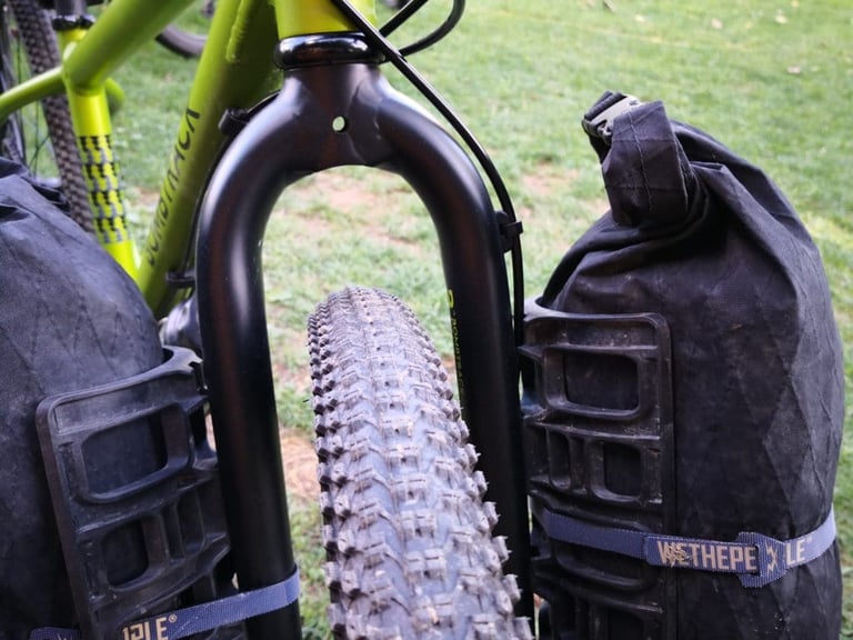 Bombtrack Beyond Junior fork with a knobbly Kenda 24in tyre and plenty of mud clearance between the legs.