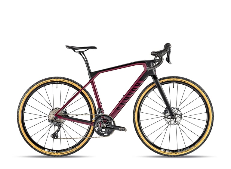 Canyon Grail WMN CF SL 8 in maroon and black with Shimano GRX 2x drivetrain, side view.