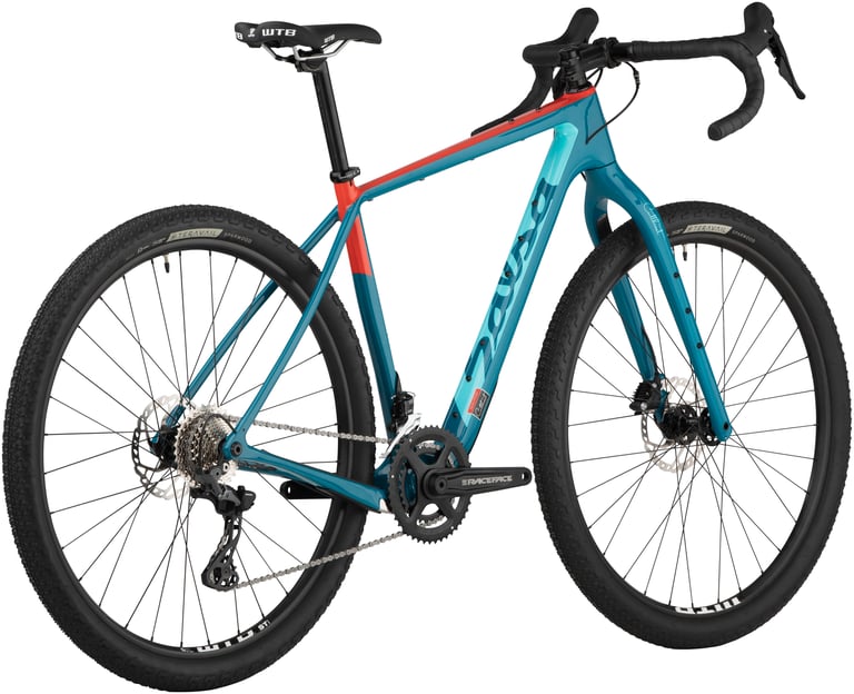 Teal Salsa Cutthroat 2020 with orange top tube and Shimano GRX 600 components, rear three-quarter studio view.