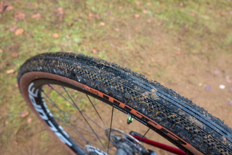 Close-up of a WTB Byway 700x44c gravel tyre with a slick centre-line on a Scope O2 wheel, Cervelo Aspero.