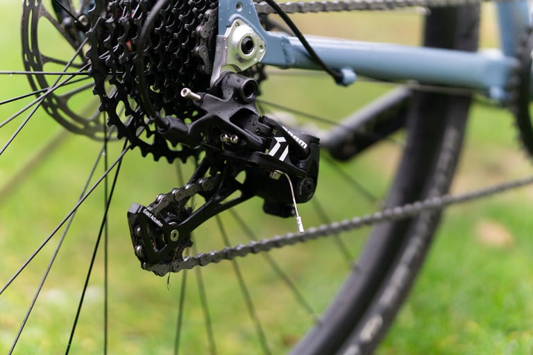 SRAM Apex 1 rear mech and 11-42t cassette on the Kinesis G2, seen from the drive side.