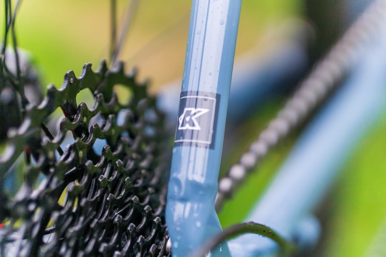 Kinesis logo decal on the G2 seatstay, beside the rear cassette and chain.