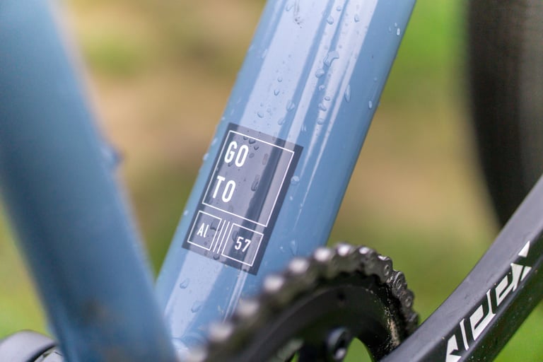 Go To sticker with size 57 marking on the seat tube of the Kinesis G2, above the SRAM Apex chainring.