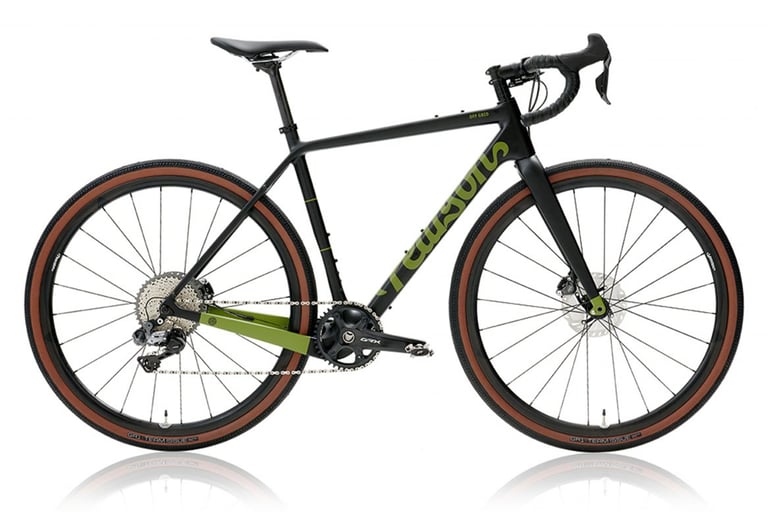 Pearson Off Grid gravel bike in matte black and olive green with tan-wall tyres, side view on white.