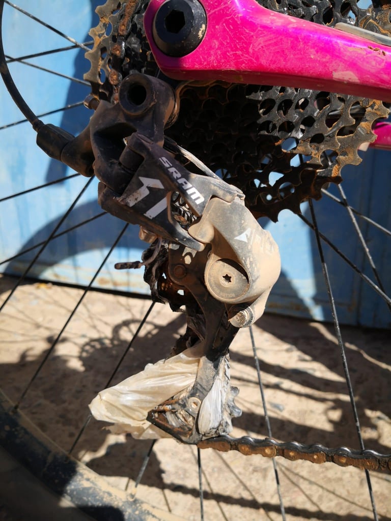 Plastic bag jammed in the SRAM rear derailleur and jockey wheels of a bike on the Atlas Mountain Race.