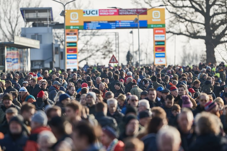 Crowds fill the approach to the UCI Cyclocross World Cup finish gantry at Hoogerheide in the Netherlands.