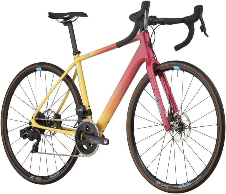 Salsa Warroad Carbon Force AXS 700 in a yellow-to-pink fade, studio shot on white.