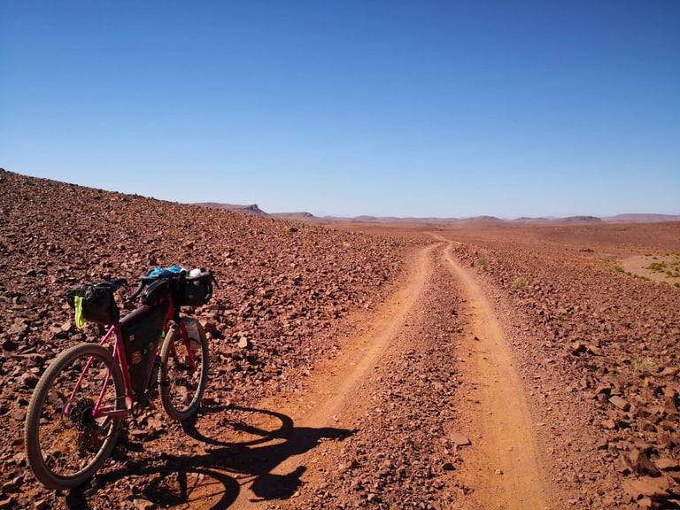 Salsa Cutthroat with bikepacking bags beside the gravel track between Ait Saoun and Taznakht on the Atlas Mountain Race.