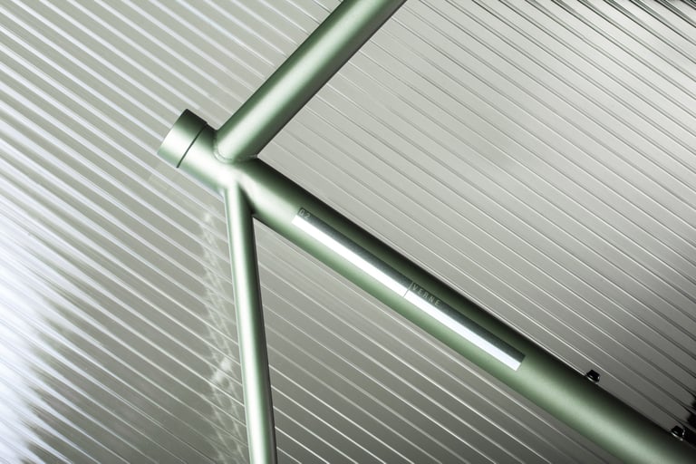 Verne frame in the green paint option, head tube and down tube with G2 Verne decal.