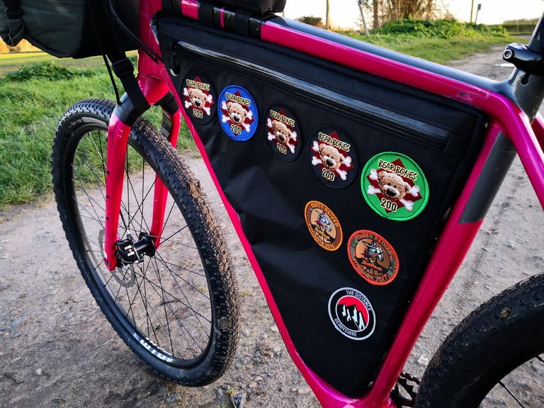 Straight Cut Design frame bag on the Salsa Cutthroat, with Bear Bones 200, Dirty Reiver and The Distance patches.