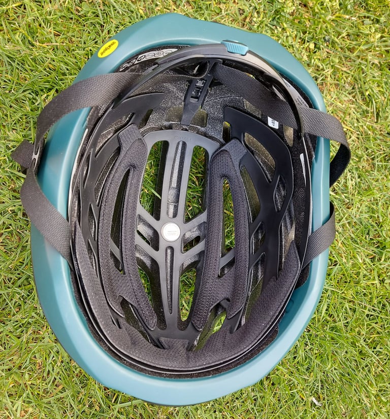 Inside of the Giro Agilis MIPS helmet showing the Roc Loc 5.5 cradle, dial adjuster, straps and foam pads.
