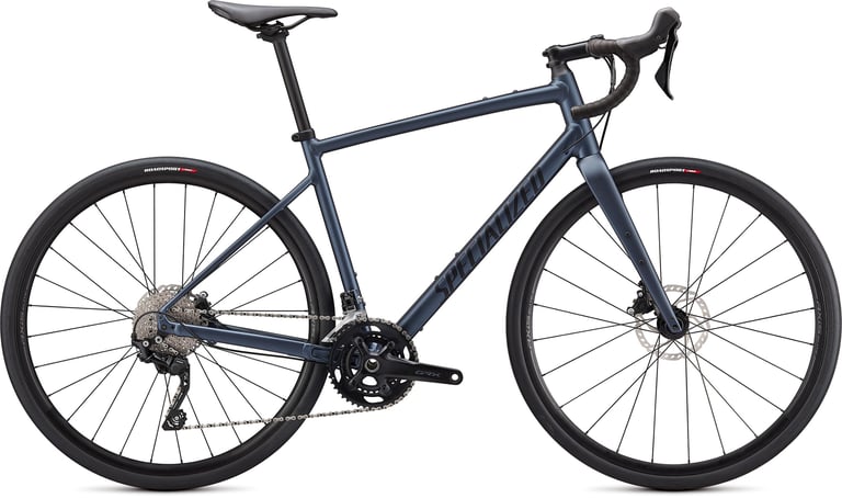 Specialized Diverge E5 Elite aluminium gravel bike in blue with Shimano GRX and slick RoadSport tyres, side view.