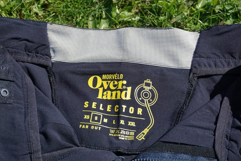 Inside the waistband of the Overland Selector shorts, with the yellow Morvélo size label and dotted grip band.