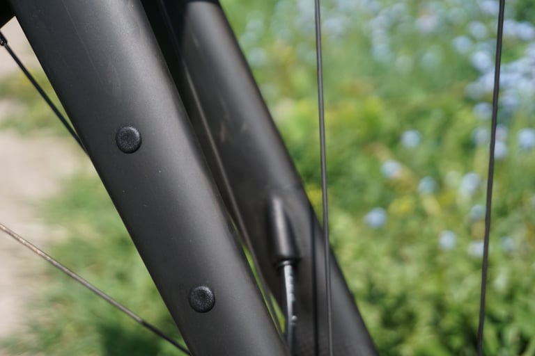 Cage mounting bosses on the fork leg of the Specialized Diverge, set up for bikepacking luggage.