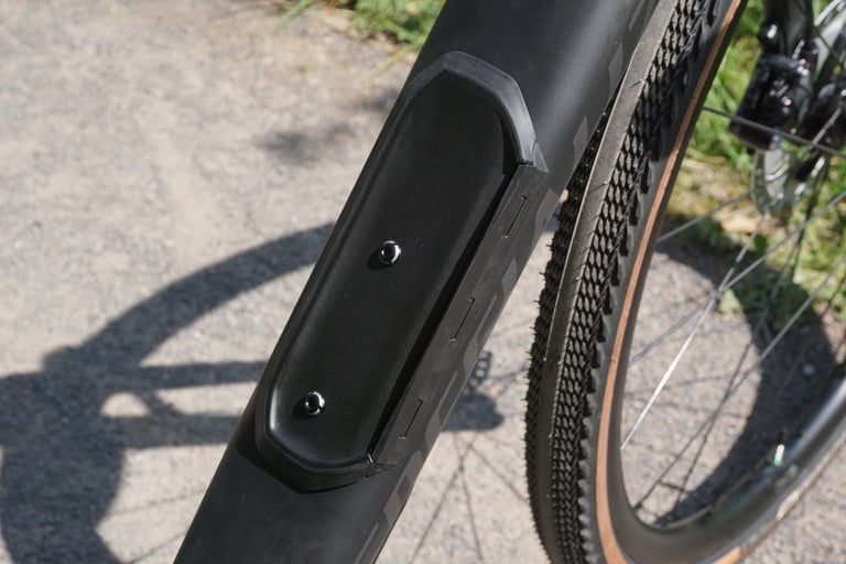 Closed SWAT storage door with bottle cage bolts on the down tube of the Specialized Diverge.